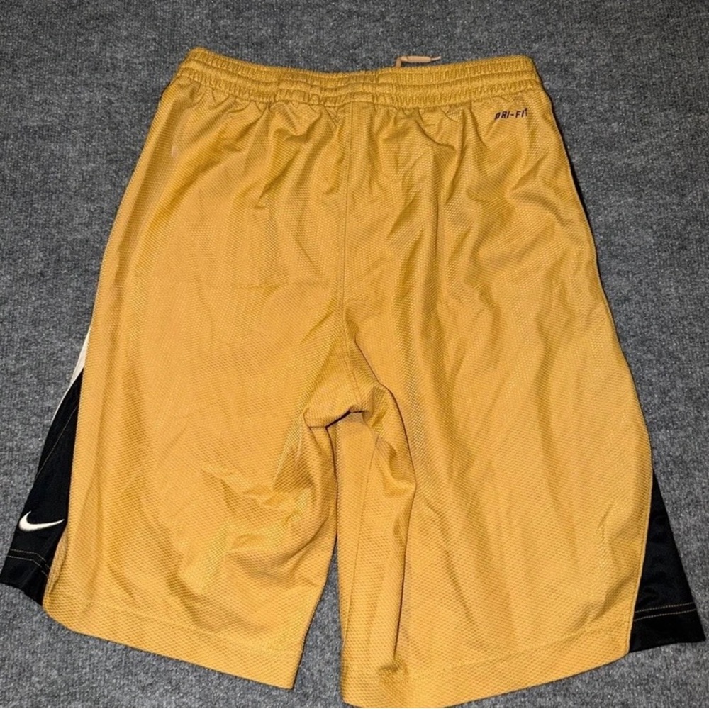 Nike Men's Yellow Athletic Basketball Shorts with Black Side Panels